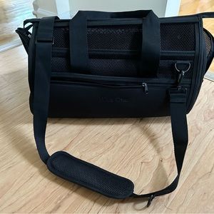 Wild one dog travel airplane airline carrier black